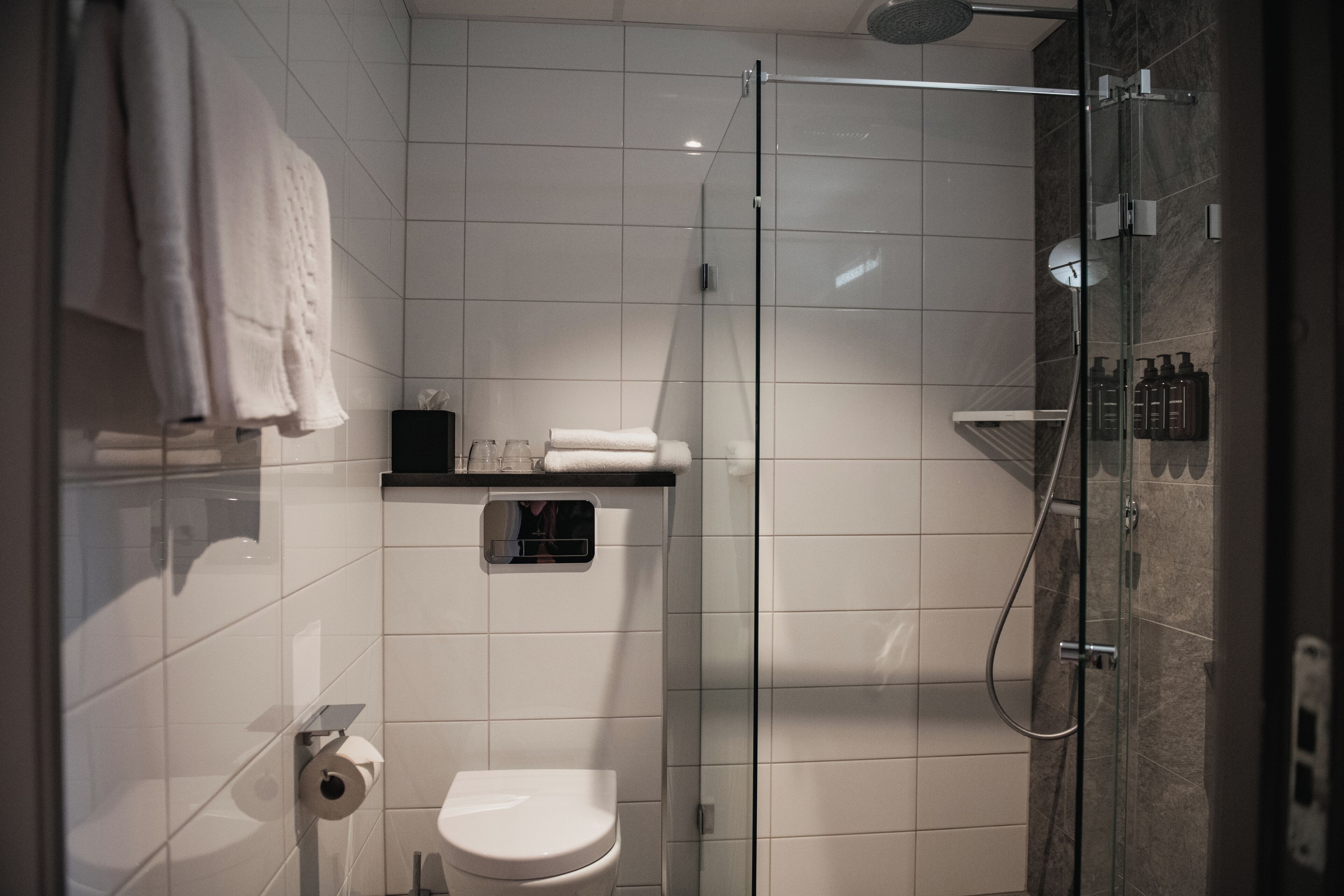 superior twin room | bathroom | shower, hair dryer, towels