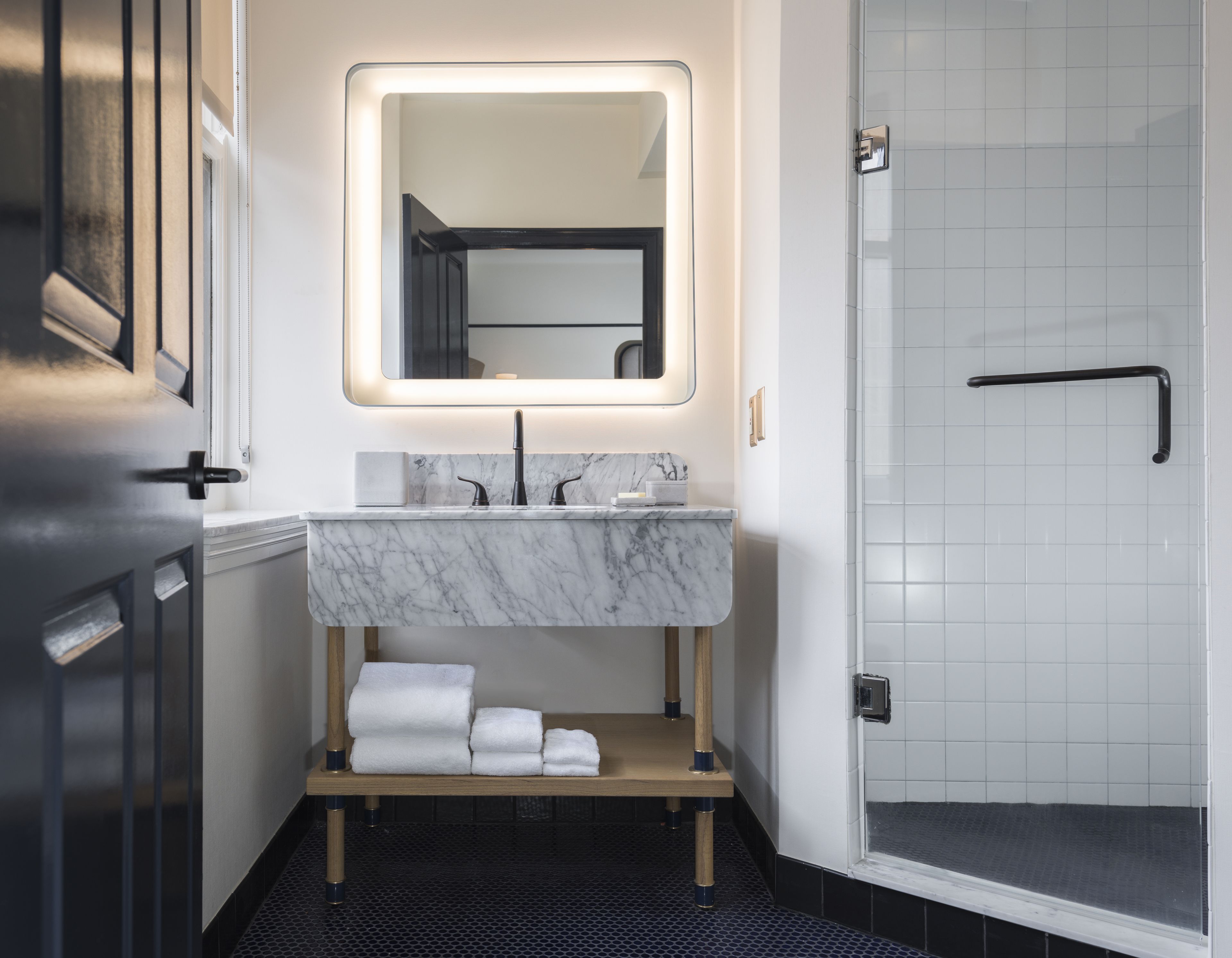 rainfall showerhead, designer toiletries, hair dryer, towels