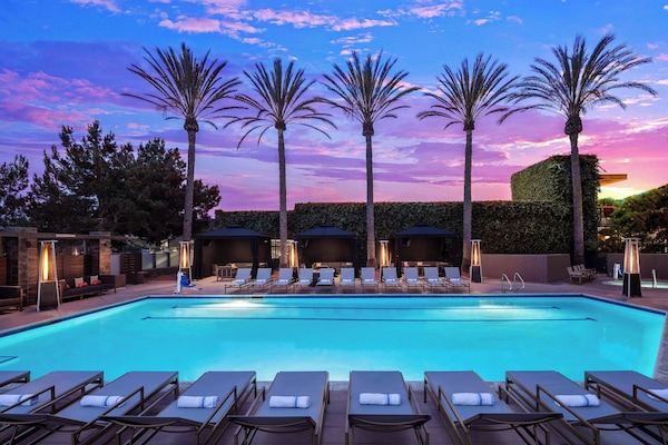 Outdoor pool, free cabanas, pool umbrellas