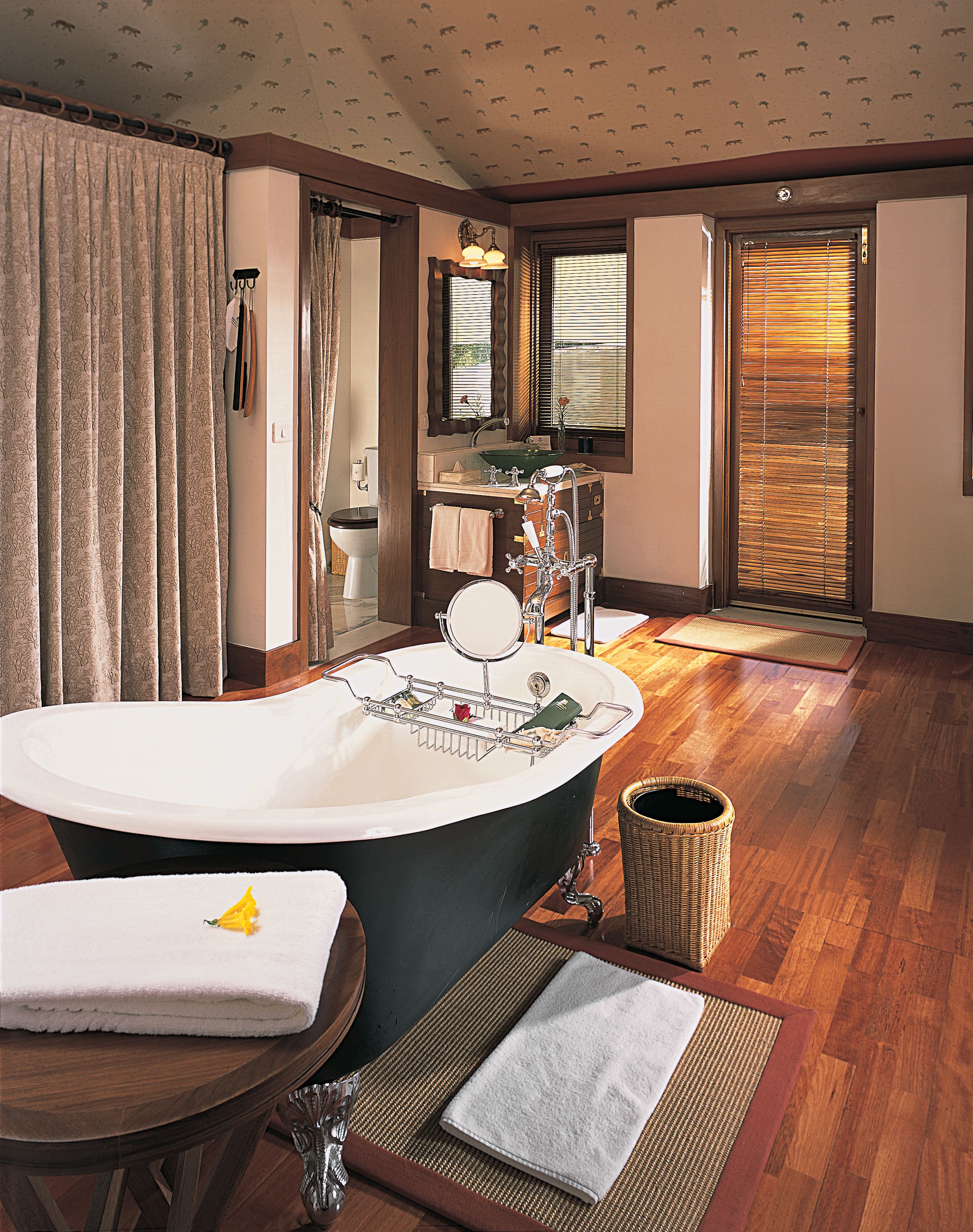 separate bathtub and shower, deep-soaking bathtub, designer toiletries