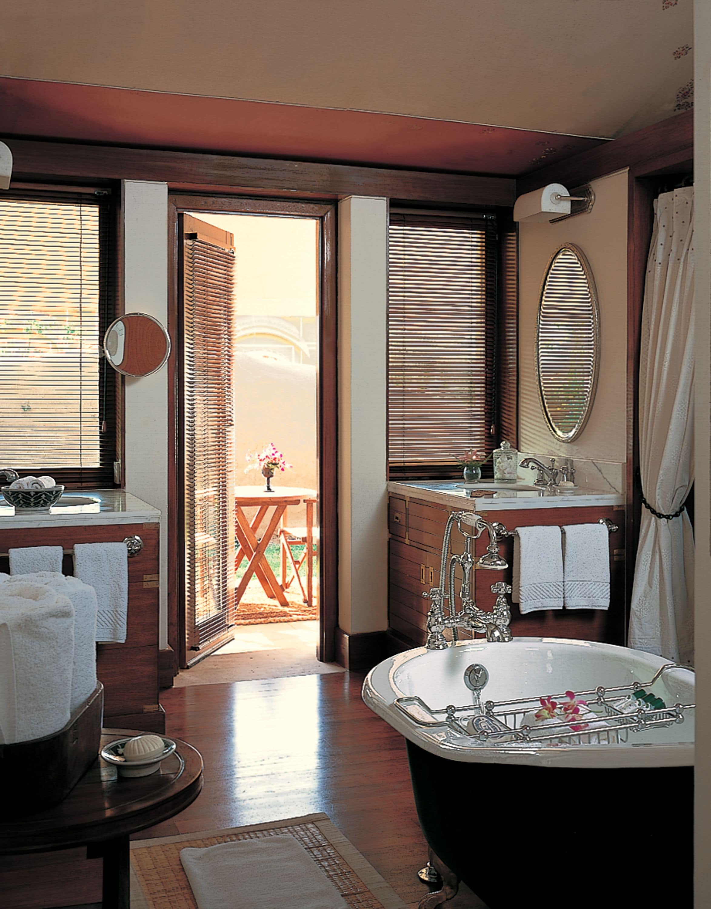 separate bathtub and shower, deep-soaking bathtub, designer toiletries