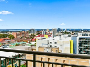 A cityscape with various buildings, including a mix of residential and commercial structures.