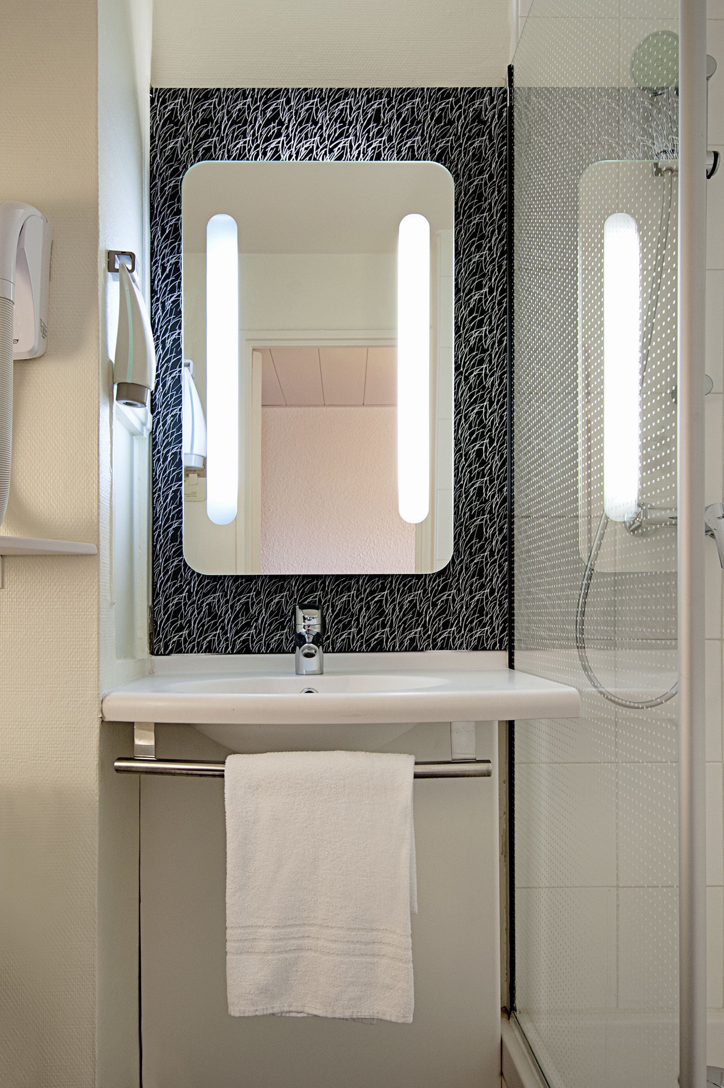 shower, eco-friendly toiletries, hair dryer, towels