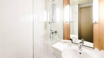 Shower, eco-friendly toiletries, hair dryer, towels