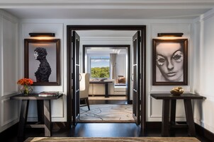 Premium bedding, down comforters, minibar, in-room safe