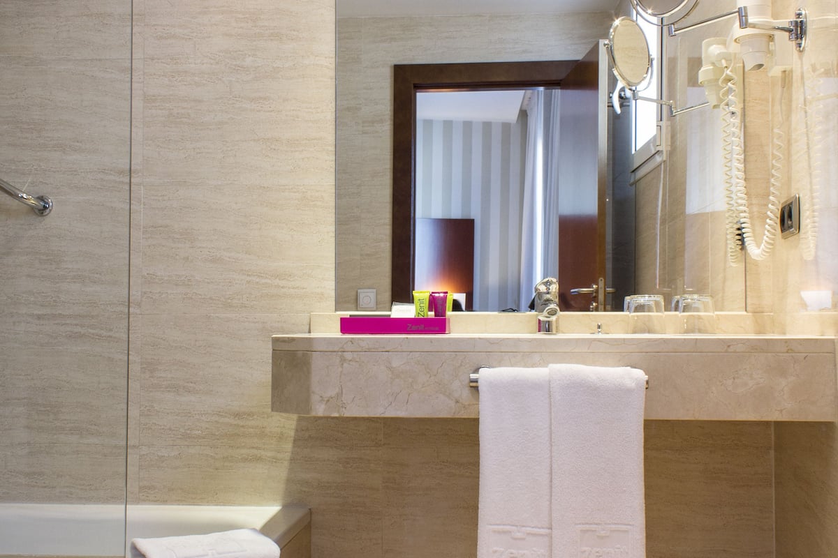 free toiletries, hair dryer, bidet, towels