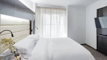 Premium bedding, down comforters, minibar, in-room safe