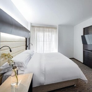 Premium bedding, down duvets, minibar, in-room safe