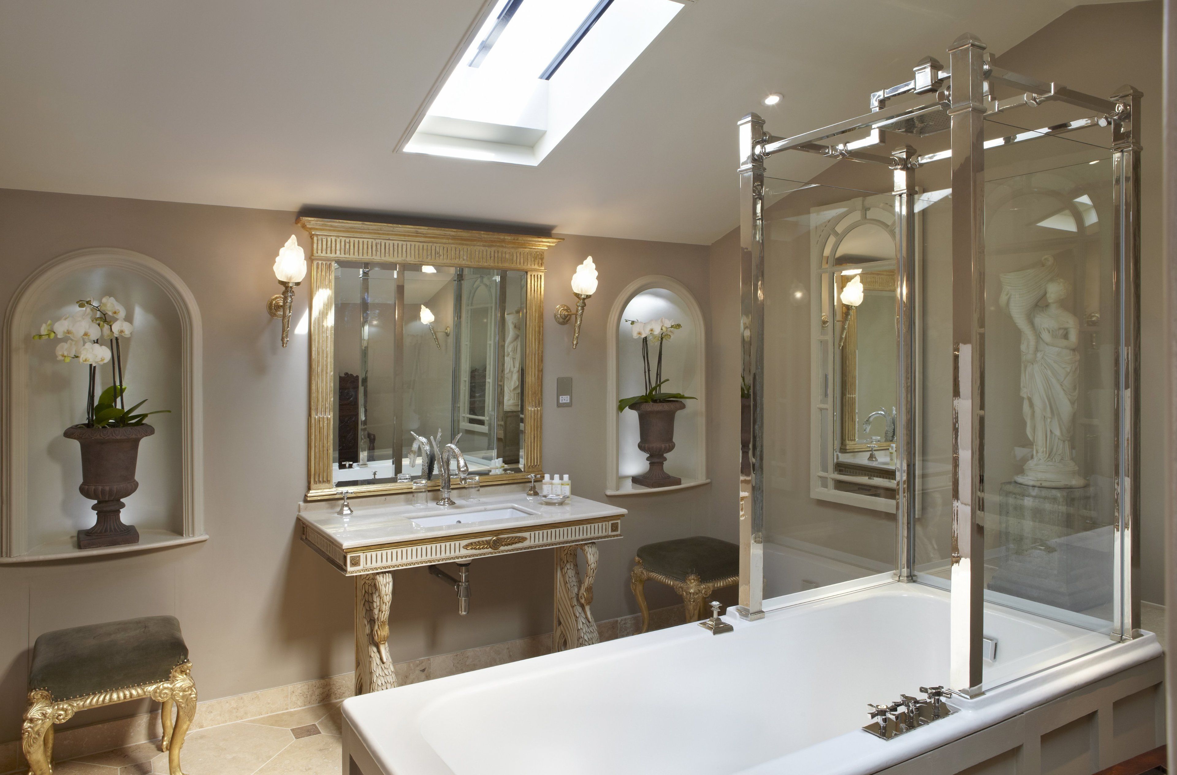 junior suite, 1 king bed | bathroom | designer toiletries, hair dryer, bathrobes, slippers