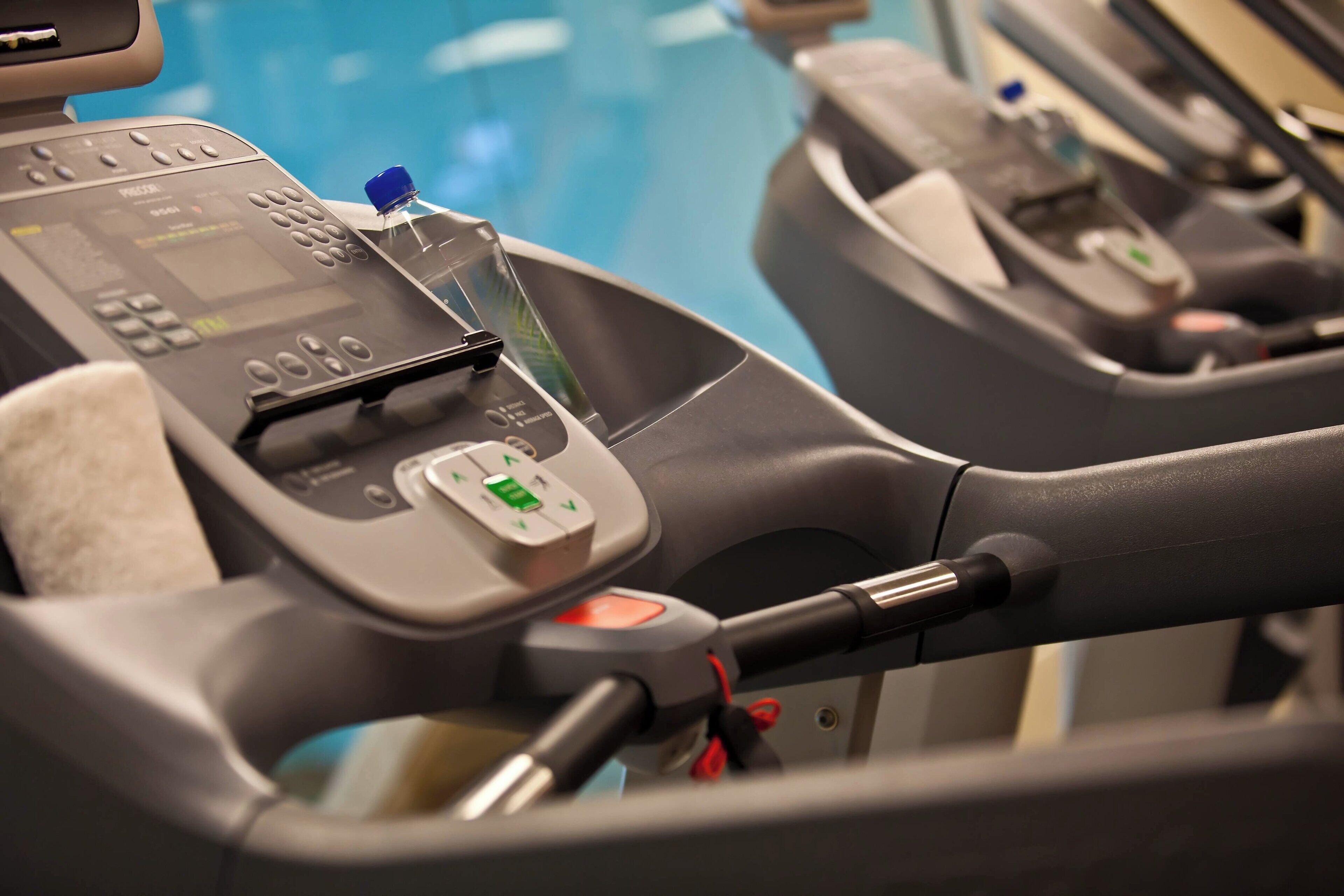 A treadmill control panel with buttons and a display.