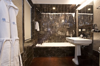 Shower, designer toiletries, hair dryer, bathrobes at City Club Hotel