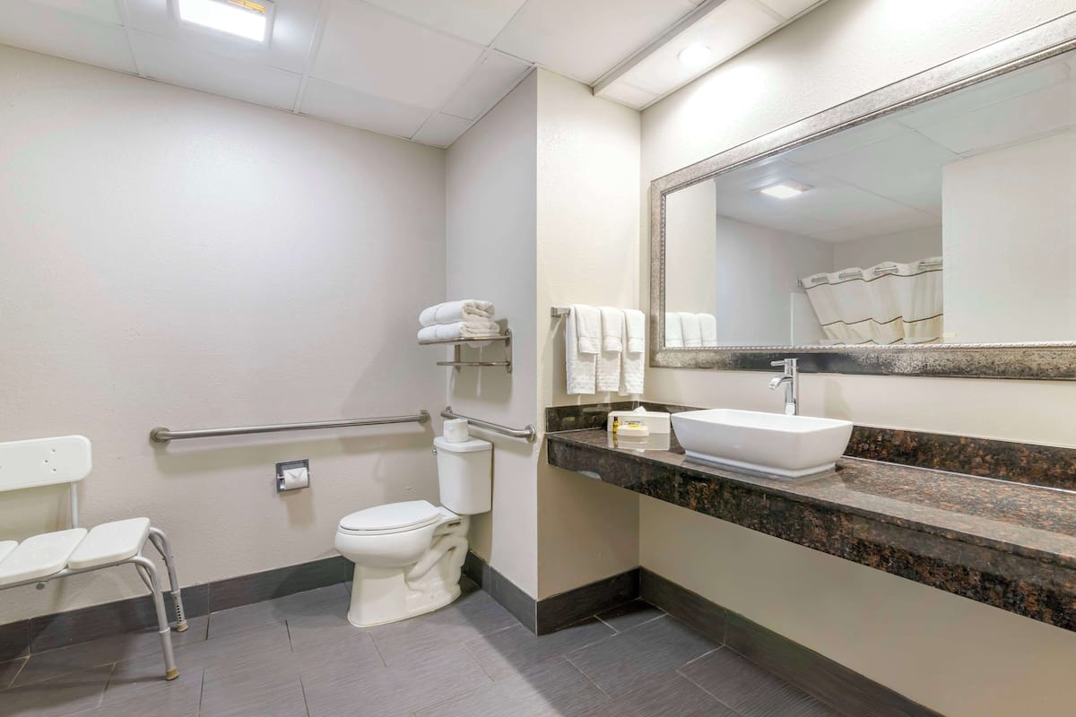 suite, 2 queen beds, accessible, non smoking | bathroom | combined shower/bathtub, free toiletries, hair dryer, towels