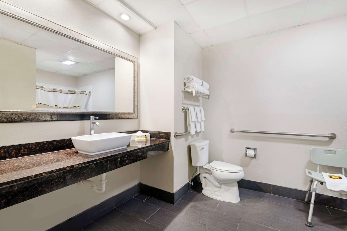 suite, 2 queen beds, accessible, non smoking | bathroom | combined shower/bathtub, free toiletries, hair dryer, towels