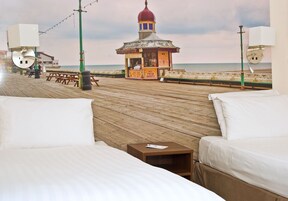 Desk, laptop workspace, blackout curtains, iron/ironing board
