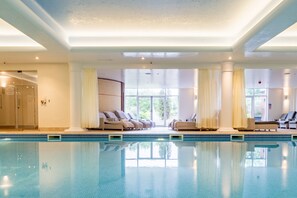 Indoor pool, open 7:30 AM to 8:00 PM, pool loungers