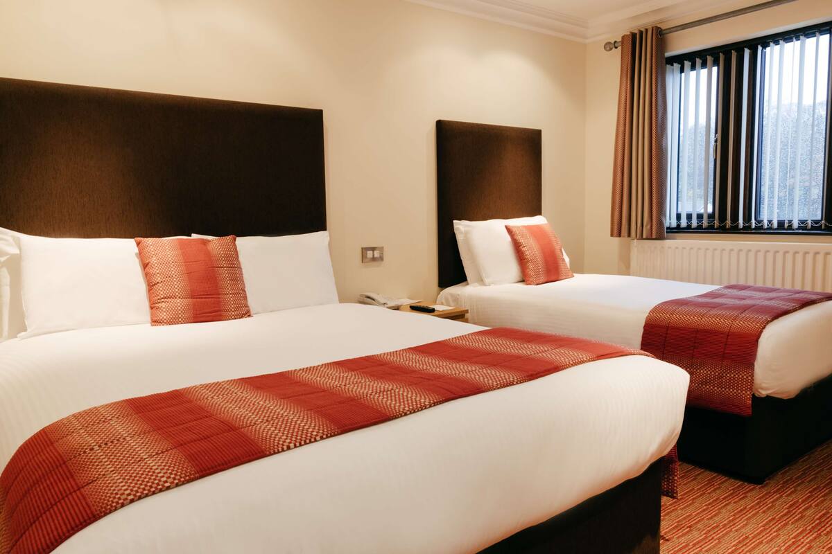 family room, multiple beds, non smoking | 1 bedroom, desk, blackout curtains, iron/ironing board