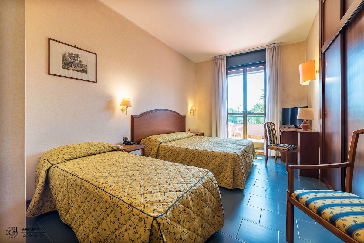 Triple Room | Down comforters, minibar, in-room safe, desk