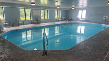 Indoor pool, open 6:00 AM to 10:00 PM, pool loungers