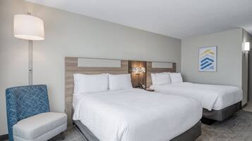 Hypo-allergenic bedding, down duvets, pillow-top beds, in-room safe