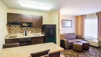 Suite, Separate Bedroom with 1 King Bed, Kitchen and Sofabed, Non Smoking | Private kitchenette | Full-size fridge, microwave, stovetop, dishwasher