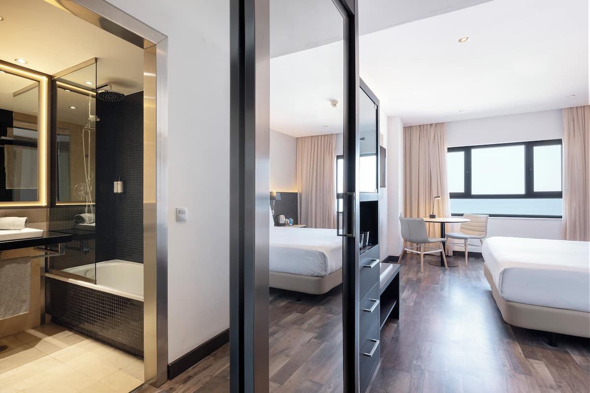 premium room, sea view | minibar, in-room safe, desk, free wifi