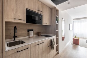 Standard Studio (2 persons) | Private kitchen | Fridge, microwave, stovetop, dishwasher