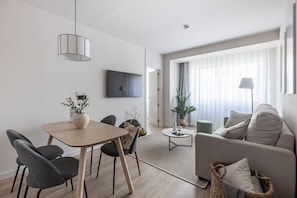 Apartment, 1 Bedroom | Living area | 45-inch TV with cable channels - Líbere Madrid Chamberí (Madrid)