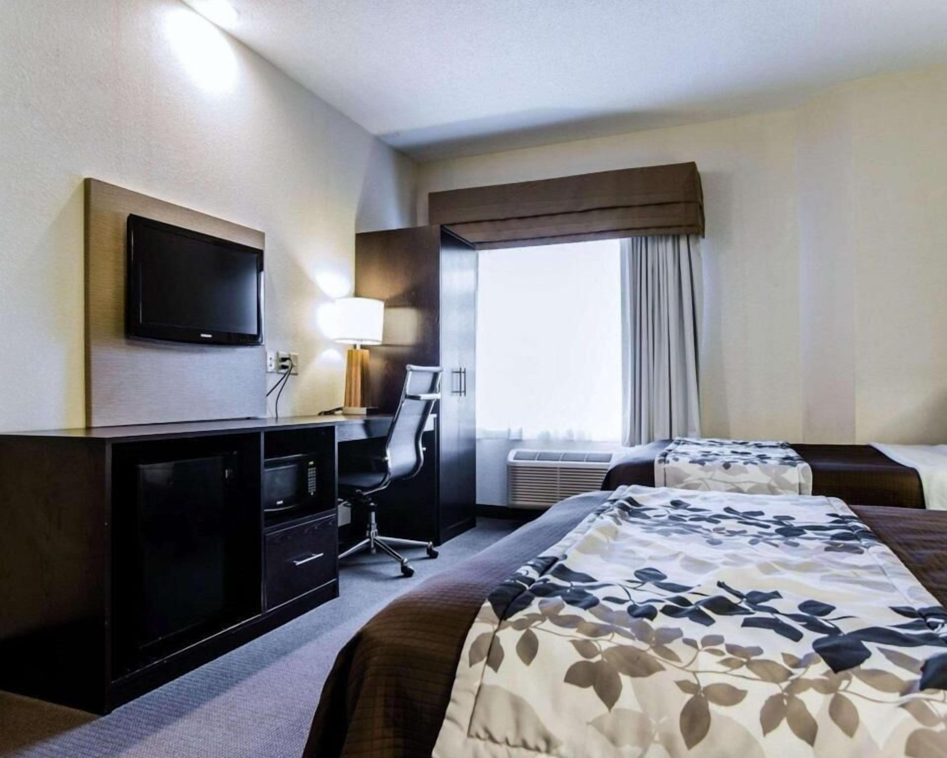 Desk, blackout drapes, iron/ironing board, rollaway beds
