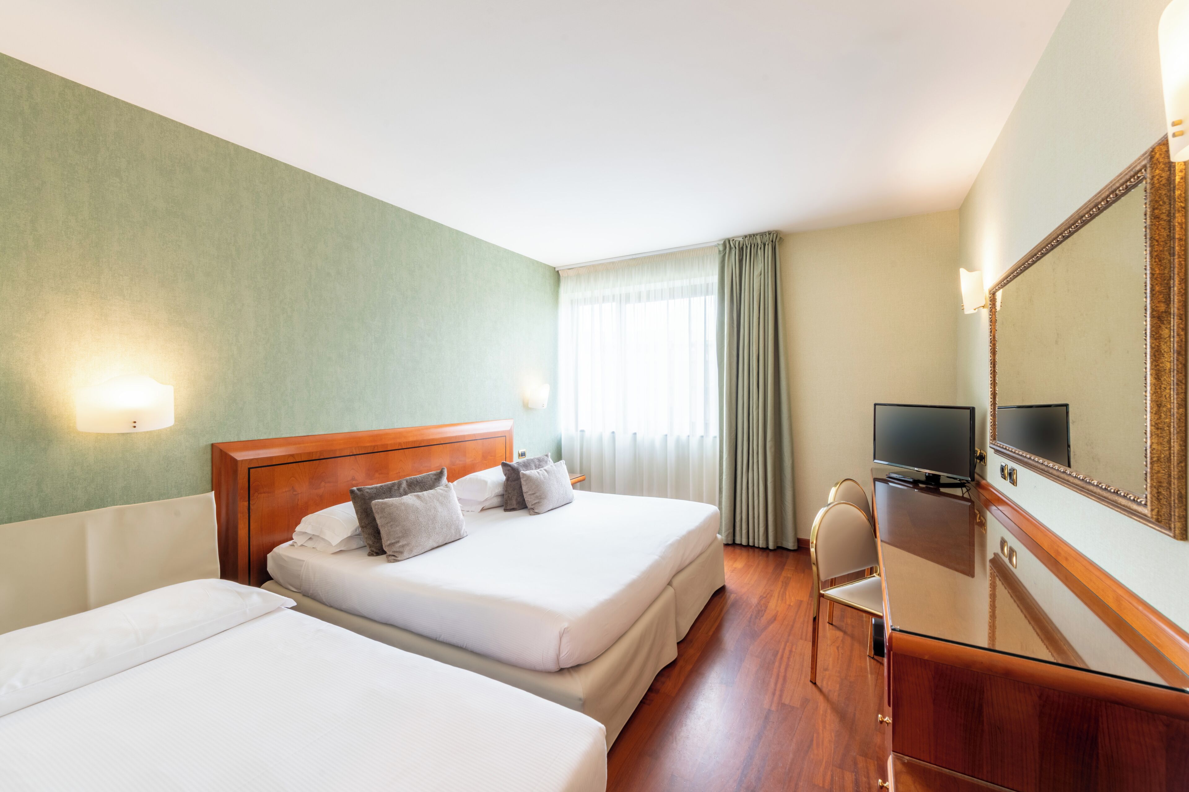 superior triple room | 1 bedroom, down duvets, minibar, in-room safe