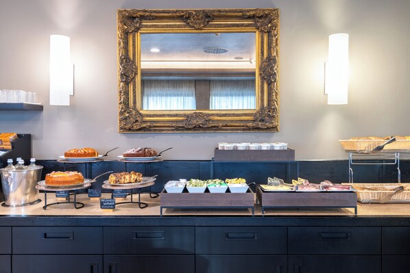 Daily buffet breakfast (EUR 18 per person)
