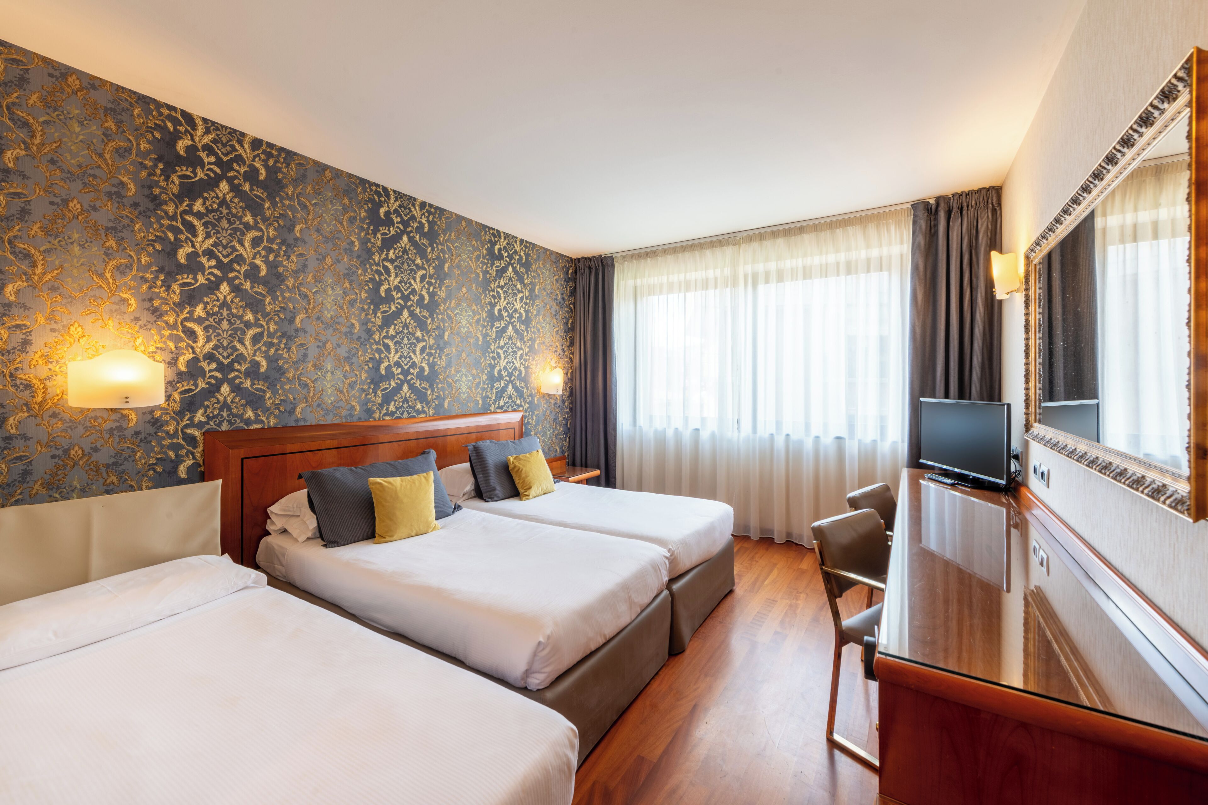 superior triple room | 1 bedroom, down duvets, minibar, in-room safe