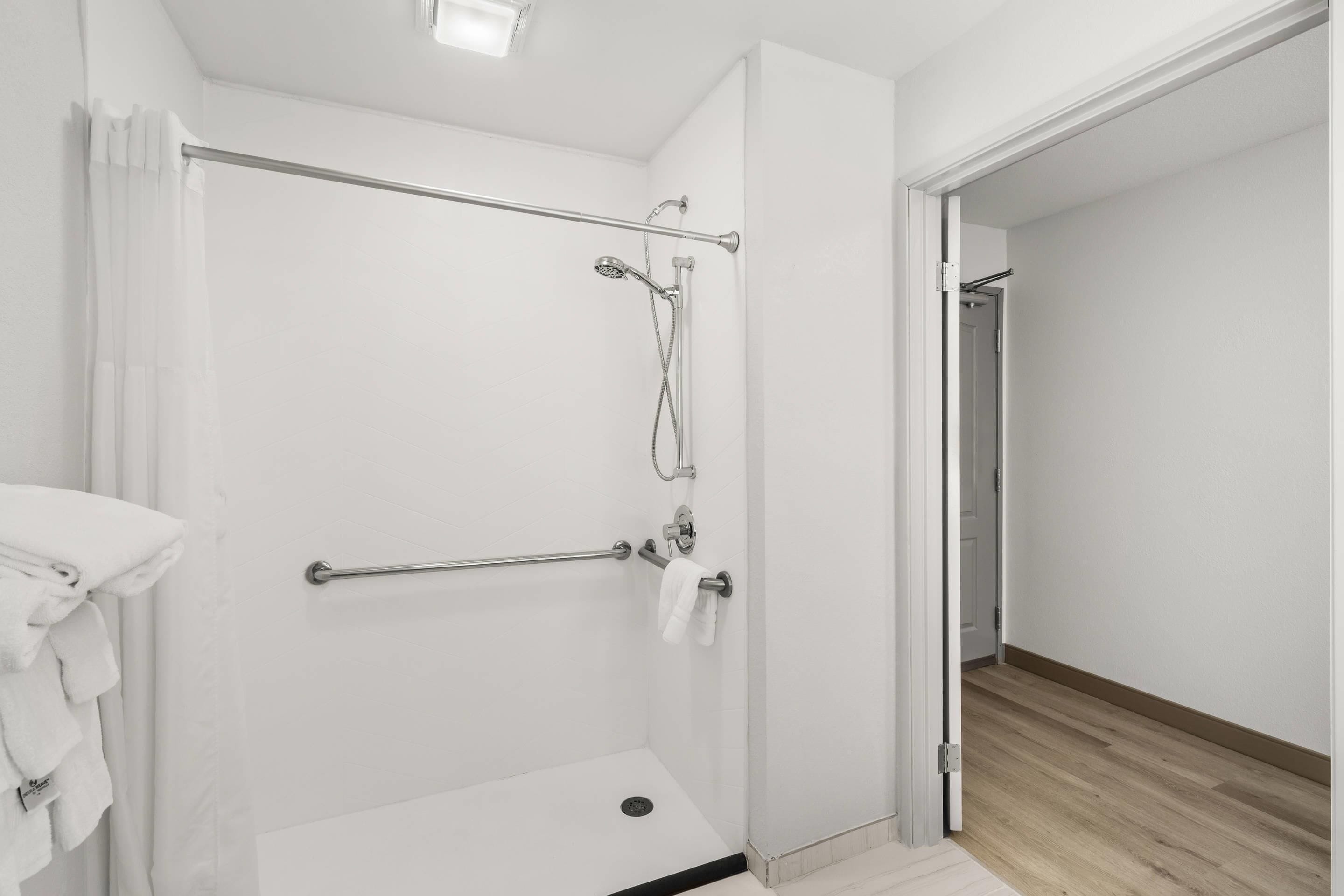 combined shower/bathtub, free toiletries, hair dryer, towels