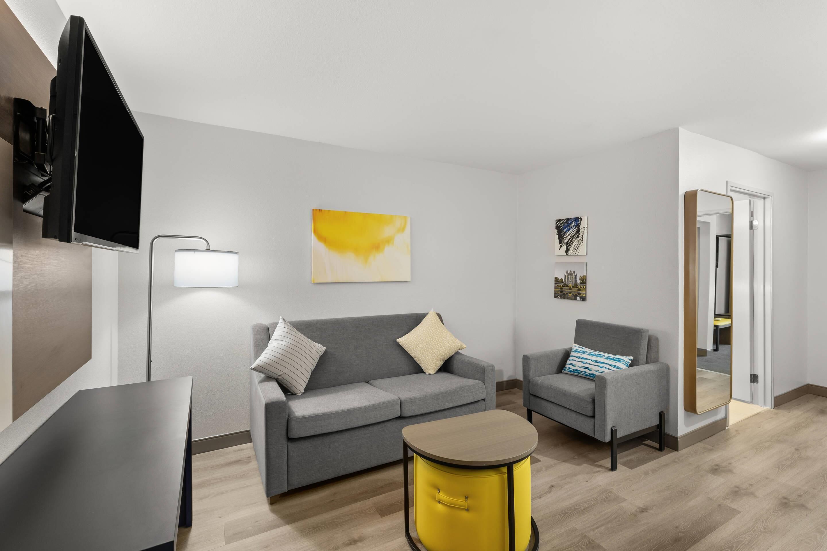 premium bedding, desk, blackout curtains, iron/ironing board