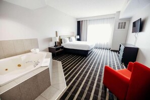 Suite Deluxe, 1 habitación, para no fumadores | Ropa de cama de alta calidad y caja de seguridad en la habitación