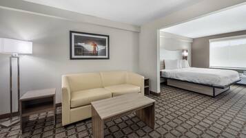 Suite, 1 King Bed, Non Smoking (with Single Sofabed) | Desk, laptop workspace, blackout curtains, iron/ironing board
