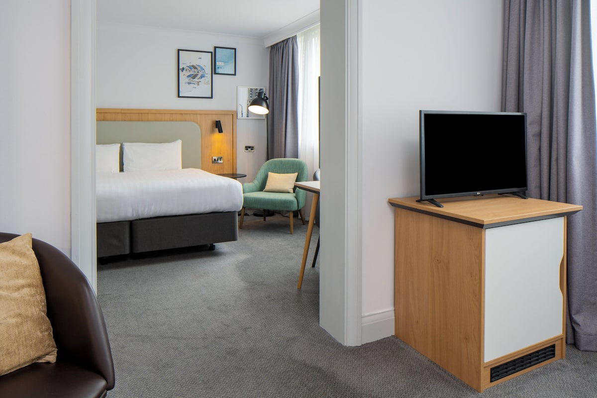 Suite, 1 Bedroom | In-room safe, desk, blackout drapes, iron/ironing board