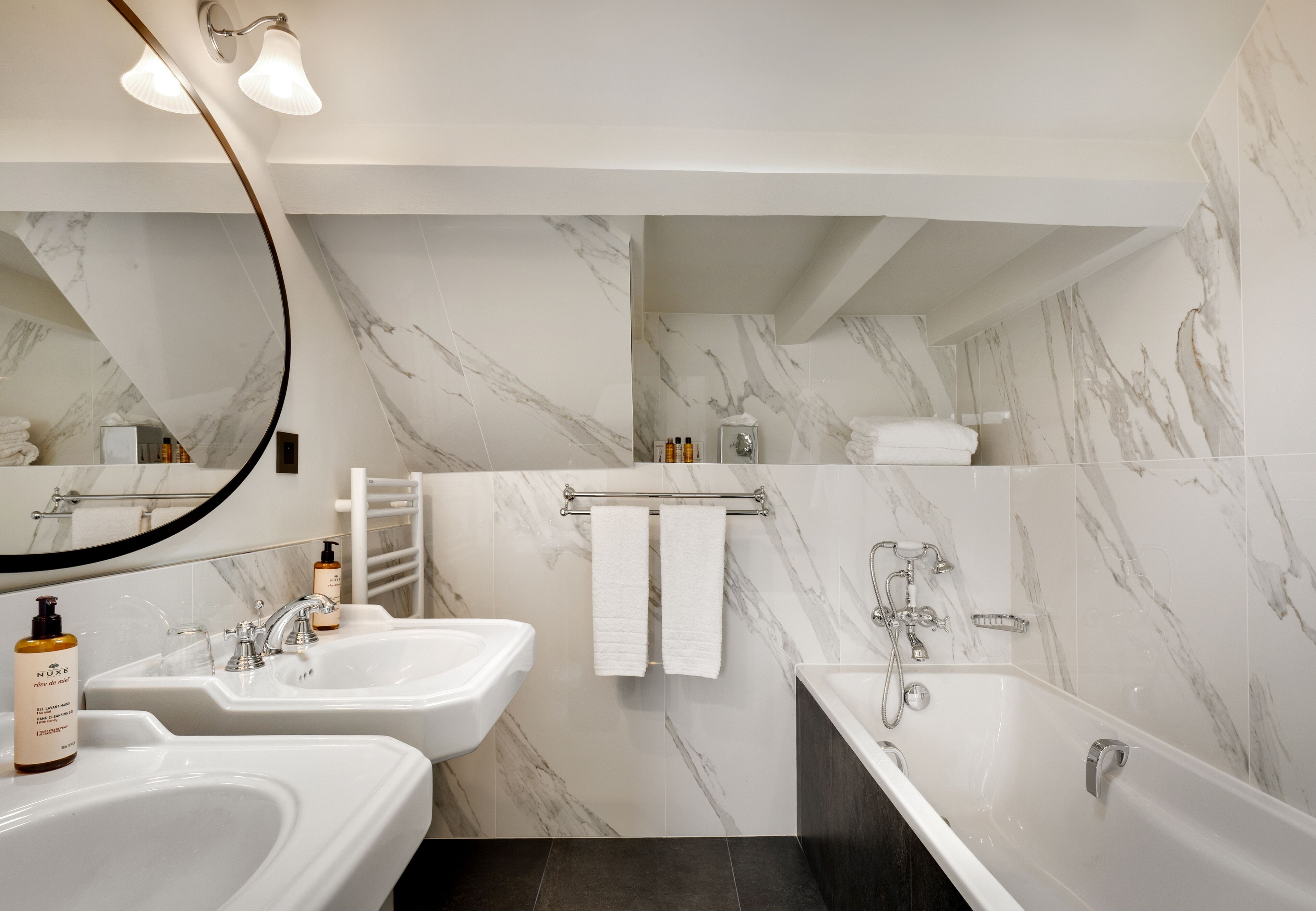 junior penthouse | bathroom | designer toiletries, hair dryer, bathrobes, slippers