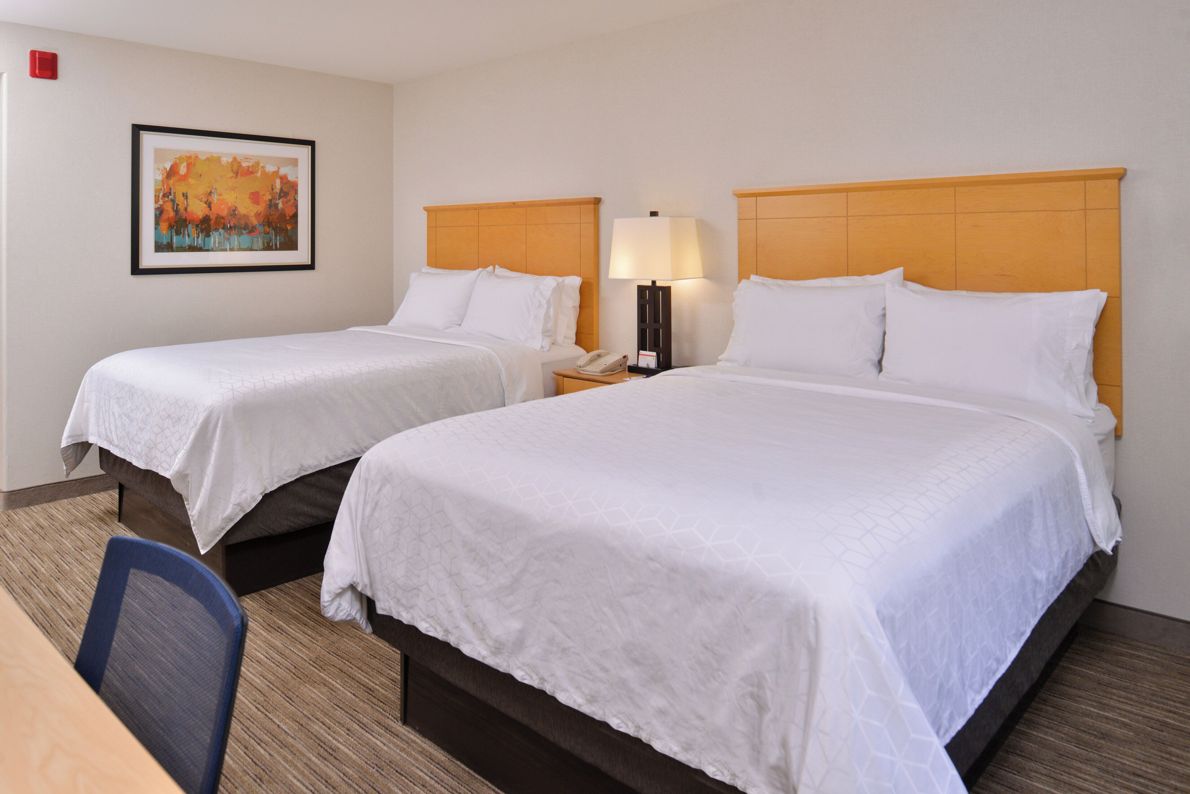 Down comforters, Tempur-Pedic beds, desk, laptop workspace