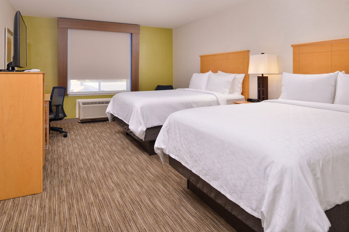 Down comforters, Tempur-Pedic beds, desk, laptop workspace