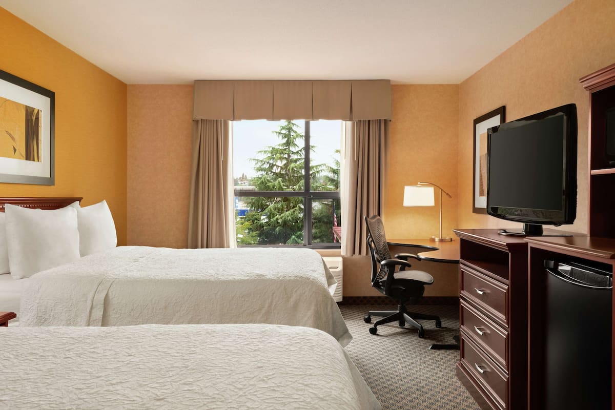 2 grands lits queen-size | Bureau, fer et planche à repasser, Wi-Fi gratuit, draps fournis