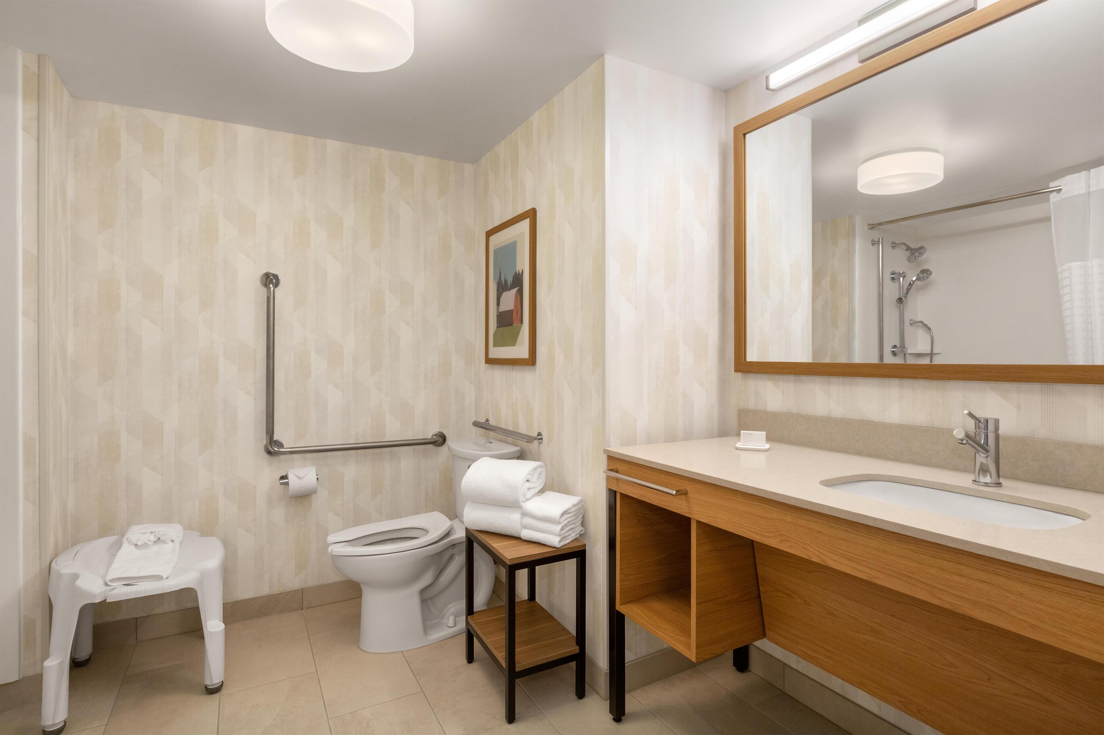 Combined shower/tub, hair dryer, towels, soap