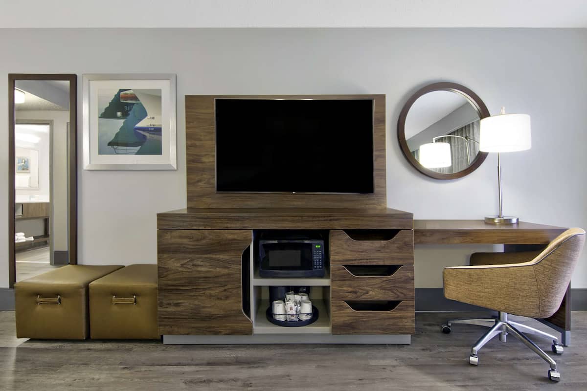 desk, laptop workspace, blackout curtains, iron/ironing board