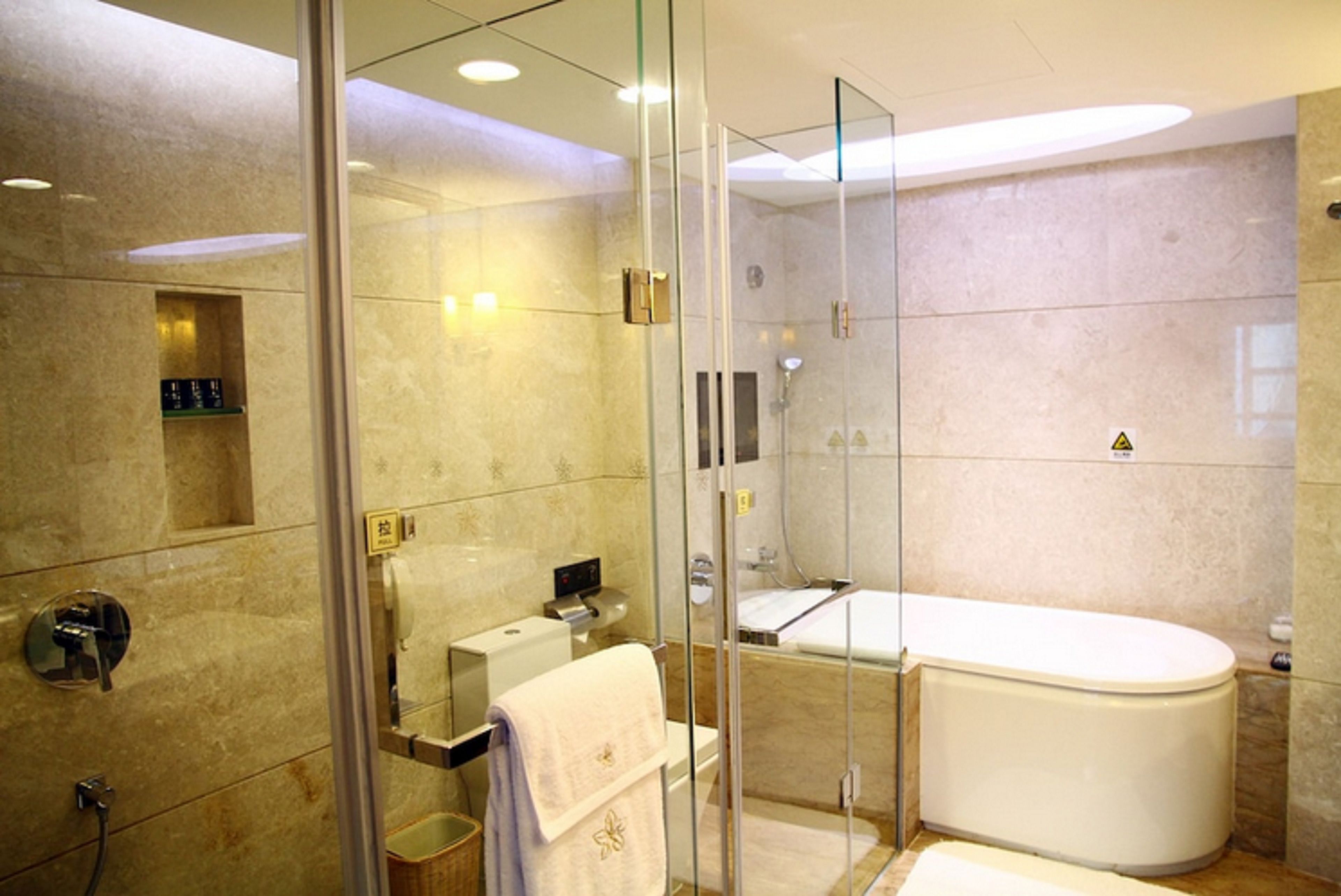 executive suite | bathroom | shower, free toiletries, hair dryer, dressing gowns