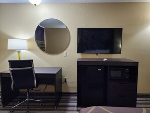 Desk, blackout drapes, iron/ironing board, free cribs/infant beds