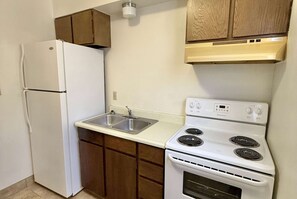 Room, 1 Queen Bed, Non Smoking | Pillow-top beds, blackout curtains, iron/ironing board - Super 8 by Wyndham Salina/Scenic Hills Area (Salina)