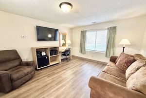 Suite, Multiple Beds, Non Smoking | Pillowtop beds, blackout drapes, iron/ironing board