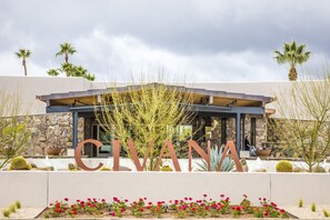 A building with a large sign spelling "CIVANA". - CIVANA Wellness Resort and Spa (Carefree)