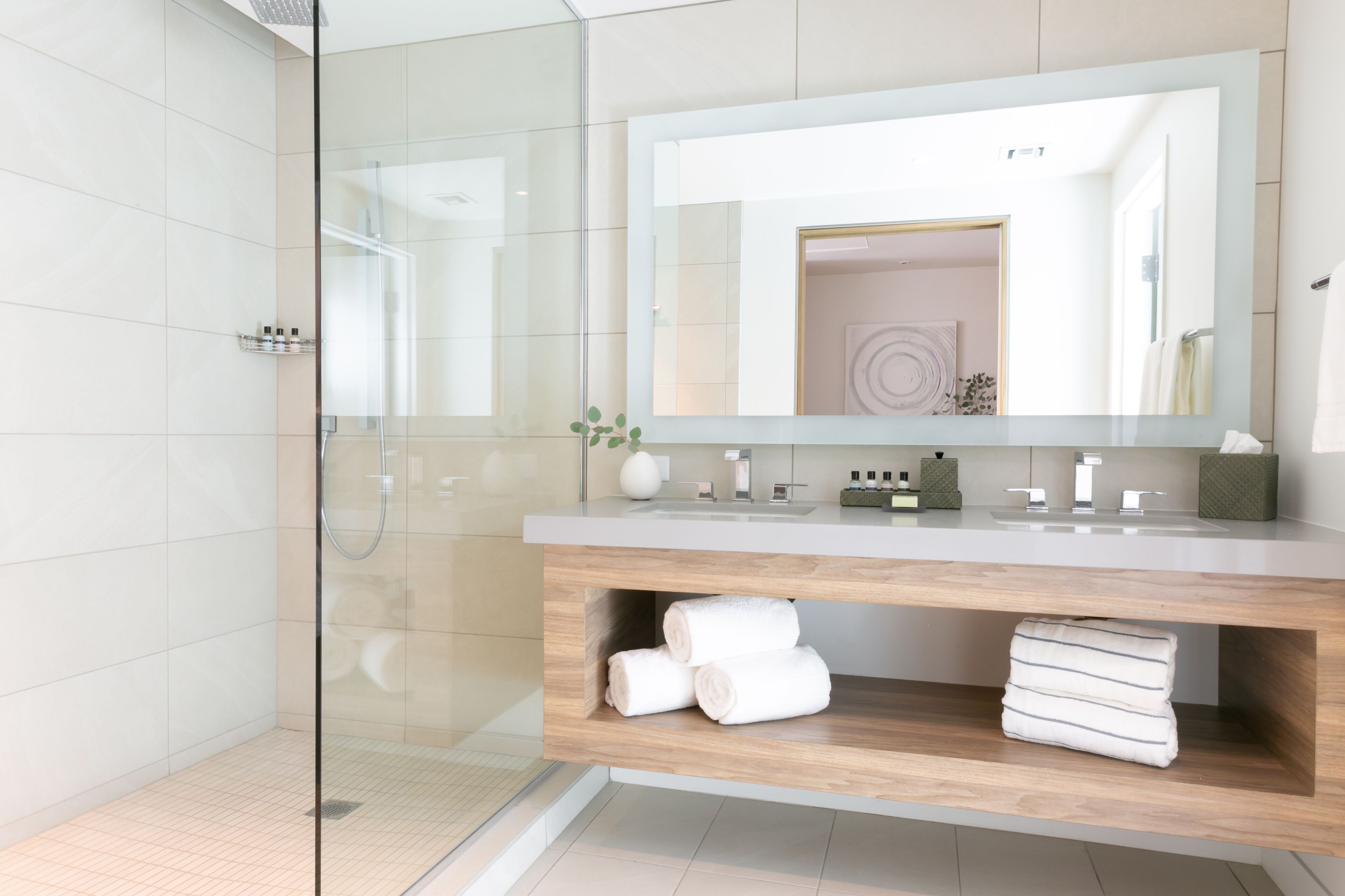 designer toiletries, hair dryer, bathrobes, slippers