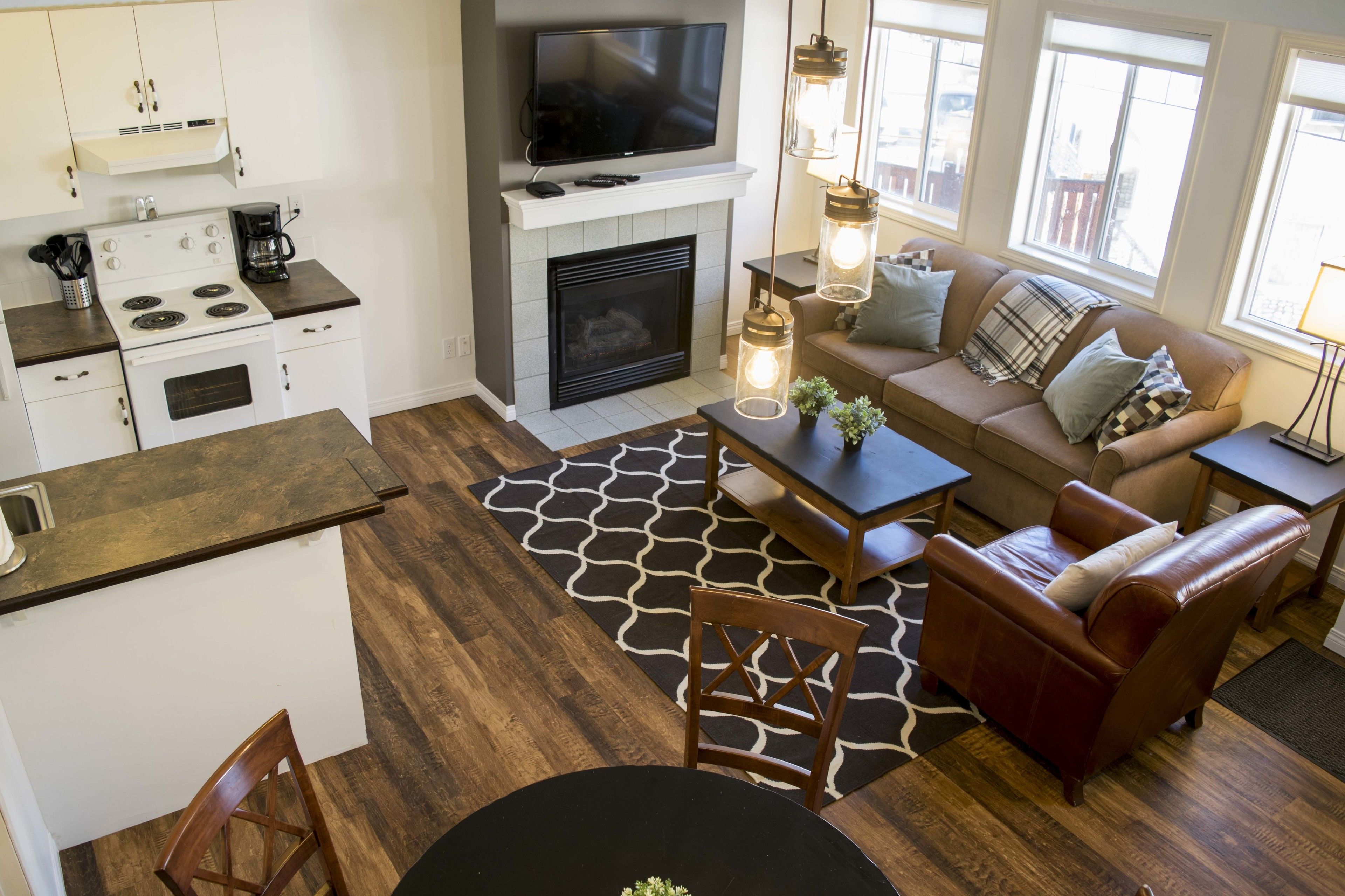 2 Bedroom Condo  | Living room | 27-inch LCD TV with cable channels, TV, fireplace