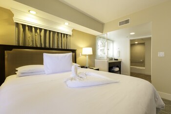 Family Condo, 2 Bedrooms, Kitchen | Desk, laptop workspace, iron/ironing board, bed sheets at Carlsbad Seapointe Resort